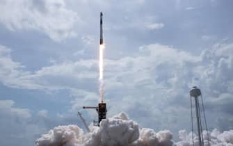 epa08455645 A SpaceX Falcon 9 rocket carrying the company's Crew Dragon spacecraft is seen in this false color infrared exposure as it is launched on NASA s SpaceX Demo-2 mission to the International Space Station with NASA astronauts Robert Behnken and Douglas Hurley on-board at NASA's Kennedy Space Center in Cape Canaveral, Florida, USA, 30 May 2020. NASA's SpaceX Demo-2 mission is the first launch with astronauts of the SpaceX Crew Dragon spacecraft and Falcon 9 rocket to the International Space Station as part of the agency s Commercial Crew Program. The test flight serves as an end-to-end demonstration of SpaceX s crew transportation system. Behnken and Hurley launched at 3:22 p.m. EDT on 30 May, from Launch Complex 39A at the Kennedy Space Center. A new era of human spaceflight is set to begin as American astronauts once again launch on an American rocket from American soil to low-Earth orbit for the first time since the conclusion of the Space Shuttle Program in 2011.  EPA/BILL INGALLS / NASA HANDOUT MANDATORY CREDIT: (NASA/BILL INGALLS) HANDOUT EDITORIAL USE ONLY/NO SALES