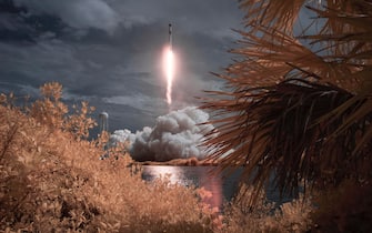 epa08455406 A SpaceX Falcon 9 rocket carrying the company's Crew Dragon spacecraft is seen in this false color infrared exposure as it is launched on NASA s SpaceX Demo-2 mission to the International Space Station with NASA astronauts Robert Behnken and Douglas Hurley onboard, at NASA's Kennedy Space Center in Cape Canaveral, Florida, USA, 30 May 2020. NASA's SpaceX Demo-2 mission is the first launch with astronauts of the SpaceX Crew Dragon spacecraft and Falcon 9 rocket to the International Space Station as part of the agency s Commercial Crew Program. The test flight serves as an end-to-end demonstration of SpaceX s crew transportation system. Behnken and Hurley launched at 3:22 p.m. EDT on 30 May, from Launch Complex 39A at the Kennedy Space Center. A new era of human spaceflight is set to begin as American astronauts once again launch on an American rocket from American soil to low-Earth orbit for the first time since the conclusion of the Space Shuttle Program in 2011.  EPA/BILL INGALLS / NASA HANDOUT MANDATORY CREDIT: (NASA/Bill Ingalls) HANDOUT EDITORIAL USE ONLY/NO SALES