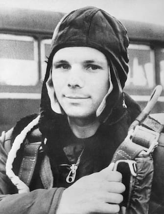 Russian Air Force Major Yuri Gagarin, age 27, became the first man in space on April 12, 1961. Gagarin was orbited around the earth and returned safely.