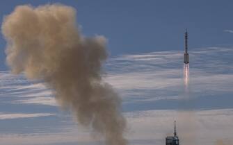 CHINA SPACE PROGRAMS SHENZHOU-12 epa09278519 The Long March-2F carrier rocket, carrying the Shenzhou-12, takes off from the launch site at the Jiuquan Satellite Launch Center, in the Gobi Desert, Inner Mongolia, near Jiuquan, China, 17 June 2021. China launched the Shenzhou-12 spacecraft carrying three crew members Tang Hongbo, Nie Haisheng, and Liu Boming to the orbiting Tianhe core module for a three-month mission on 17 June. The mission is China's first manned spaceflight in almost five years. EPA/ROMAN PILIPEY