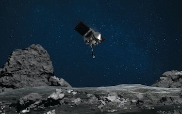 Handout of artists impression of NASA's Origins Explorer spacecraft 'OSIRIS-REx.&#x92; A NASA spacecraft extended an 11-foot-long robot arm and descended to the surface of a small, rubble-strewn asteroid called Bennu Tuesday, briefly pressing a collection device into the rocky body in a bold attempt to capture rock and soil samples for return to Earth. On the way down, moving at a glacial four inches per second, the SUV-size OSIRIS-REx spacecraft had to dodge a towering, building-size mound of rocks known as "Mount Doom" to reach the targeted sample collection site near the middle of a shallow, rock-covered crater dubbed "Nightingale." Photo by NASA via ABACAPRESS.COM