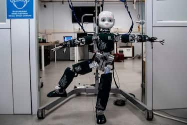 TOPSHOT - A photo taken on May 21, 2020 shows "iCub", an open source cognitive humanoid robot, at the Italian Institute of Technology ((IIT)) in Genoa, Liguria, as the country eases its lockdown during the Phase 2 of deconfinment within the COVID-19 infection, caused by the novel coronavirus. - The iCub robot is developed at IIT as part of the EU project RobotCub and subsequently adopted by more than 20 laboratories worldwide. It has 53 motors that move the head, arms and hands, waist, and legs. It can see and hear. The goal of RobotCub is to study cognition through the implementation of a humanoid robot the size of a 3.5 year old child. (Photo by MARCO BERTORELLO / AFP) (Photo by MARCO BERTORELLO/AFP via Getty Images)