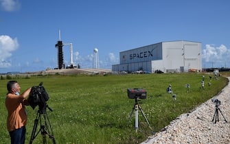 FLORIDA, UNITED STATES - SEPTEMBER 15: Media photographers set up cameras to take the launch of Falcon 9 rocket and a Crew Dragon capsule at pad 39A at NASAâs Kennedy Space Center in Cape Canaveral, Florida on September 15, 2021. SpaceX is scheduled to launch the first completely private Inspiration4 mission at 8:02 p.m. tonight, carrying four civilians into orbit, with a splashdown 3 days later off the coast of Florida. (Photo by Paul Hennessy/Anadolu Agency via Getty Images)