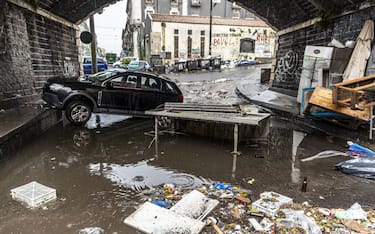 CATANIA, ITALY - OCTOBER 26: A vehicle stuck in an underpass after flood following the heavy rain in Catania, Italy on October 26, 2021. Many businesses and houses on the streets were flooded, cars were also dragged or submerged in the flood. There were long-term power cuts in the city center of Catania due to the downpour. (Photo by Salvatore Allegra/Anadolu Agency via Getty Images)