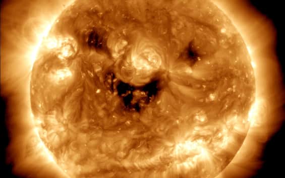 The Sun seems to smile: spectacular photos from the NASA telescope