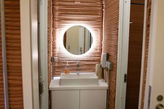 1251595226 A bathroom inside of CHAPEA's Mars Dune Alpha at the Johnson Space center in Houston, Texas on April 11, 2023. - CHAPEA's Mars Dune Alpha is a 3D printed habitat designed to serve as an analog for one-year missions. (Photo by Mark Felix / AFP) (Photo by MARK FELIX/AFP /AFP via Getty Images)