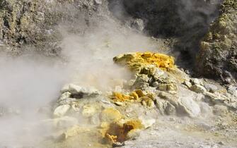 Gas emitting fumarole in the Solfatara volcano in Italy