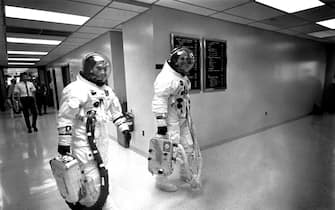 Apollo 10 astronauts John W. Young (left), command module pilot; and Thomas P. Stafford, commander, leave the Kennedy Space Center's (KSC) Manned Spacecraft Operations Building