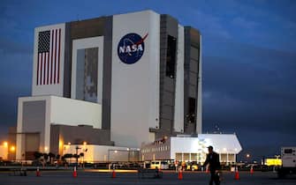 CAPE CANAVERAL, FL - FEBRUARY 07:  Clouds are seen behind the NASA's Vehicle Assembly Building (VAB) at the Kennedy Space Center February 7, 2008 at Cape Canaveral, Florida. Bad weather is threatening today?s scheduled 2:34 pm EST launch of the Space Shuttle Atlantis.   (Photo by Mark Wilson/Getty Images)
