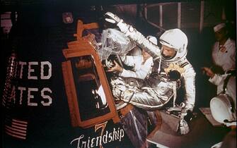 907419 376869 01: Astronaut John Glenn, Jr. is loaded into the Friendship 7 capsule in preparation for flight on the Mercury Titan rocket February 20, 1962