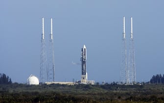 56608040 CAPE CANAVERAL, FL - JANUARY 17: A Lockheed Martin Atlas V rocket sits on pad 41 carrying NASA's Pluto New Horizons spacecraft at the Kennedy Space Center January 17, 2006 in Cape Canaveral, Florida. The launch of the spacecraft has been delayed because of high winds on the launch pad. The New Horizons mission is scheduled to conduct at five-month reconnaissance study of Pluto and Charon in 2015. (Photo by Matt Stroshane/Getty Images)