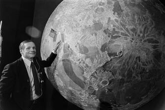 This picture taken on July 10, 1979 in Paris shows Neil Armstrong, US astronaut of the first lunar mission Apollo 11poseing during a TV show. Armstrong, who died on August 25, 2012 at the age of 82 from complications following heart surgery earlier this month, inspired generations to reach for the stars and etched his name next to one of the great milestones of human discovery. AFP PHOTO PIERRE GUILLAUD        (Photo credit should read PIERRE GUILLAUD/AFP/GettyImages)