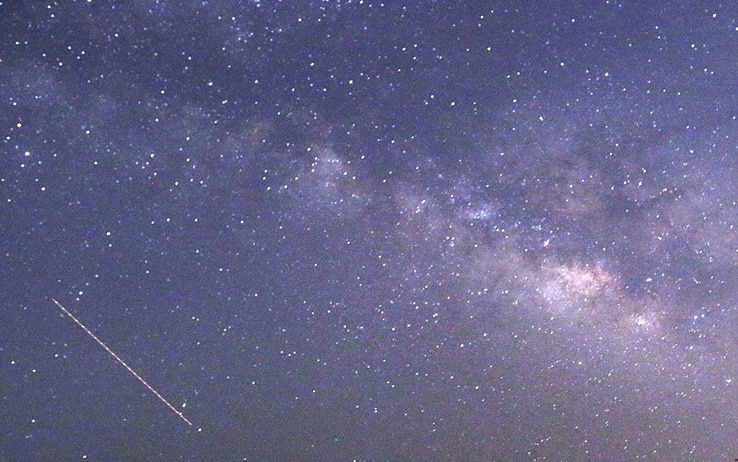 CORRECTION
This long-exposure photograph taken on April 23, 2015 on Earth Day shows Lyrids meteors shower passing near the Milky Way in the clear night sky of Thanlyin, nearly 14miles away from Yangon. AFP PHOTO / Ye Aung Thu        (Photo credit should read Ye Aung Thu/AFP via Getty Images)