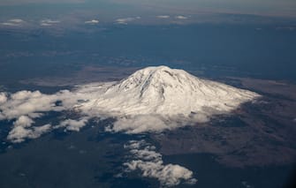 SEATTLE, WA - SEPTEMBER 21:  A view of Mount St. Helens is photographed from an Alaska Airlines flight flying at 30,000 feet on September 21, 2021, near Seattle, Washington. Mount St. Helens is an active stratovolcano located in Skamania County, 98 miles south of Seattle, and is part of the Cascade Volcanic Arc, a segment of the Pacific Ring of Fire.  (Photo by George Rose/Getty Images)