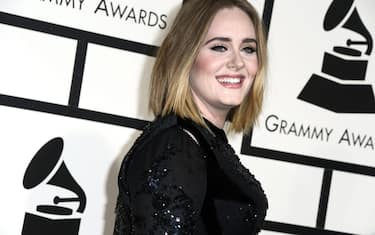 epa05662582 (FILE) A file picture dated 15 February 2016, of British singer Adele arriving for the 58th annual Grammy Awards at the Staples Center in Los Angeles, California, USA. The 2017 Grammy nominees were announced 06 December 2016, with Adele receiving five nominations, including Record of the Year.  EPA/PAUL BUCK
