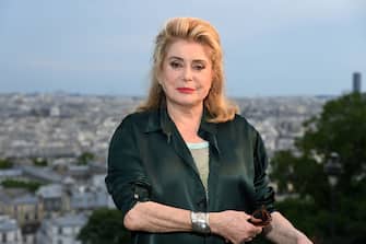 PARIS, FRANCE - JUNE 23: (EDITORIAL USE ONLY - For Non-Editorial use please seek approval from Fashion House) Catherine Deneuve attends the AMI - Alexandre Mattiussi Menswear Spring Summer 2023 show as part of Paris Fashion Week  on June 23, 2022 in Paris, France. (Photo by Pascal Le Segretain/Getty Images)