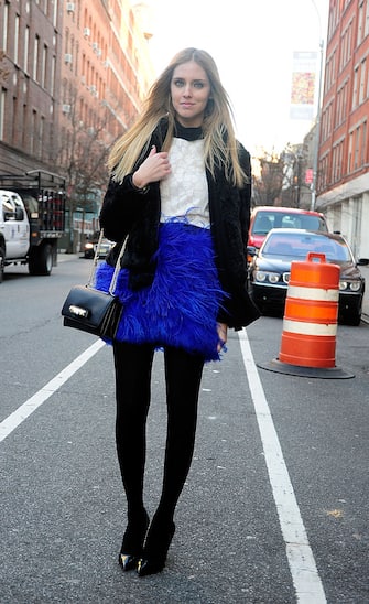 NEW YORK, NY - FEBRUARY 13: Blogger Chiara arrives at the Alice and olivia show wearing a Milly top, Zara skirt, Louis Vuitton shoes, H&M jacket, and Valentino bag on February 13, 2012 in New York City.  (Photo by Daniel Zuchnik/Getty Images)