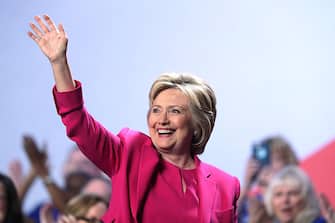 WASHINGTON, DC - JULY 05:  Democratic presidential candidate Hillary Rodham Clinton waves after she addressed the 95th Representative Assembly of the National Education Association July 5, 2016 in Washington, DC. Clinton will be joined by President Barack Obama at a campaign stop in Charlotte, North Carolina later today.  (Photo by Alex Wong/Getty Images)
