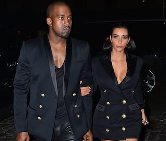 458551144 NEW YORK, NY - NOVEMBER 06: Kanye West and Kim Kardashian arrive to Soho House New York on November 6, 2014 in New York City. (Photo by James Devaney/GC Images)