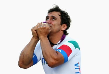 LONGFIELD, ENGLAND - SEPTEMBER 07:  Alessandro Zanardi of Italy celebrates with his gold medal after winning the Men's Individual H4 Road Race on day 9 of the London 2012 Paralympic Games at Brands Hatch on September 7, 2012 in Longfield, England.  (Photo by Bryn Lennon/Getty Images)