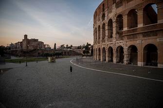 ROME, ITALY - MARCH 10: The area around the Colosseum (Colosseo), which is closed to visitors, empty of tourists during the Coronavirus emergency, on March 10, 2020, in Rome, Italy. Today the Italian government imposed unprecedented national restrictions to control the spread of the coronavirus (Covid-19). The number of confirmed cases of the Coronavirus COVID-19 disease in Italy has jumped up to at least 7985 while the death toll has surpassed 463. (Photo by Antonio Masiello/Getty Images)