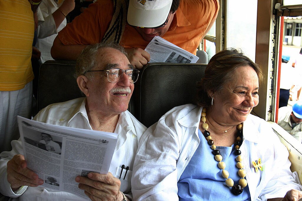 74359624 Santa Marta, COLOMBIA: Colombian Nobel Prize for Literature 1982 Gabriel Garcia Marquez (L), sitting in the carriage alongisde his wife Mercedes Barcha, smiles upon arriving at his hometown Aracataca by train 30 May, 2007 in Santa Marta, Colombia. Garcia Marquez didn't visit Aracataca in twenty years. AFP PHOTO/Alejandra VEGA (Photo credit should read ALEJANDRA VEGA/AFP via Getty Images)