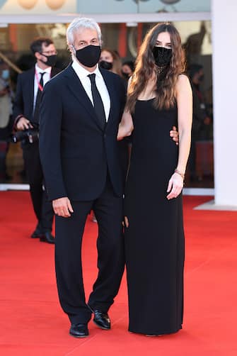 VENICE, ITALY - SEPTEMBER 12: Domenico Procacci and Kasia Smutniak walk the red carpet ahead of closing ceremony at the 77th Venice Film Festival on September 12, 2020 in Venice, Italy. (Photo by Daniele Venturelli/WireImage)