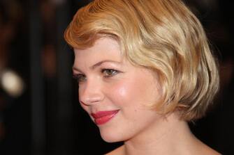 US actress Michelle Williams poses as she arrives to attend the screening of Canadian director Atom Egoyan's film 'Adoration' at the 61st Cannes International Film Festival on May 22, 2008 in Cannes, southern France. The May 14-25 festival winds up with the awards ceremony for the prestigious Palme d'Or, to be determined by a jury headed by Hollywood "bad boy" Sean Penn.     AFP PHOTO / VALERY HACHE (Photo credit should read VALERY HACHE/AFP via Getty Images)