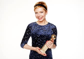 BEVERLY HILLS, CA - JANUARY 15:  Actress Michelle Williams, winner of the Best Performance by an Actress in a Motion Picture - Musical or Comedy for "My Week with Marilyn " poses for a portrait backstage at the 69th Annual Golden Globe Awards held at the Beverly Hilton Hotel on January 15, 2012 in Beverly Hills, California.  (Photo by Christopher Polk/Getty Images)