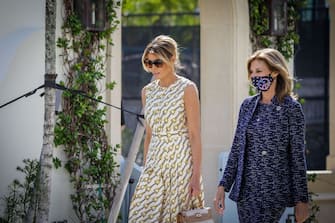 After voting, First Lady Melania Trump(L) leaves the Morton and Barbara Mandel Recreation Center with the Palm Beach County Supervisor of Elections Wendy Sartory Link in Palm Beach, Florida on November, 3, 2020. - The First Lady is registered to vote at her address at the Mar-a-Lago Club in Palm Beach, Florida. The center was closed for approximately 45 minutes to accommodate Mealnia Trumps vote. With its 29 electoral votes, Florida is crucial to both candidates. (Photo by Zak BENNETT / AFP) (Photo by ZAK BENNETT/AFP via Getty Images)