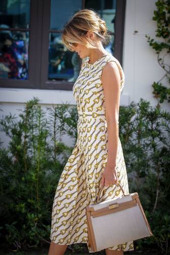 After voting, First Lady Melania Trump leaves the Morton and Barbara Mandel Recreation Center in Palm Beach, Florida on November, 3, 2020. - The First Lady is registered to vote at her address at the Mar-a-Lago Club in Palm Beach, Florida. The center was closed for approximately 45 minutes to accommodate Mealnia Trumps vote. With its 29 electoral votes, Florida is crucial to both candidates. (Photo by Zak BENNETT / AFP) (Photo by ZAK BENNETT/AFP via Getty Images)