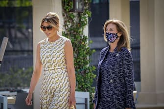 After voting, First Lady Melania Trump(L) leaves the Morton and Barbara Mandel Recreation Center with the Palm Beach County Supervisor of Elections Wendy Sartory Link in Palm Beach, Florida on November, 3, 2020. - The First Lady is registered to vote at her address at the Mar-a-Lago Club in Palm Beach, Florida. The center was closed for approximately 45 minutes to accommodate Mealnia Trumps vote. With its 29 electoral votes, Florida is crucial to both candidates. (Photo by Zak BENNETT / AFP) (Photo by ZAK BENNETT/AFP via Getty Images)