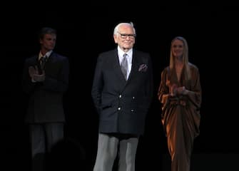 epa02770585 French designer Pierre Cardin (C) onstage during his fashion show in Moscow's Kremlin, Russia, 07 June 2011. Cardin arrived on 06 June in Moscow and presented his new collection at the Kremlin.  EPA/MAXIM SHIPENKOV