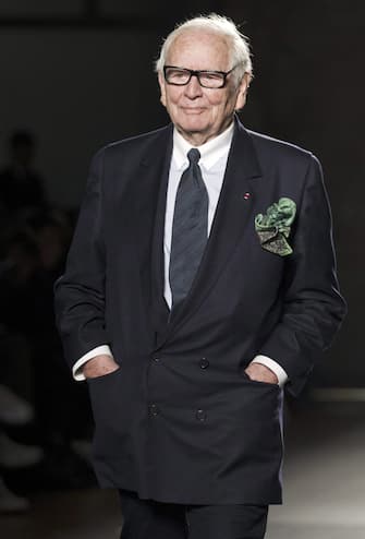 epa03083221 French designer Pierre Cardin takes to the catwalk after the presentation of his collection on the last day of the 9th '080 Barcelona Fashion' Week, in Barcelona, Spain, 28 January 2012.  EPA/ALEJANDRO GARCIA