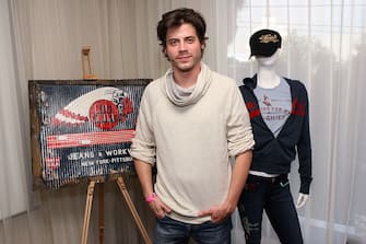 WEST HOLLYWOOD, CA - FEBRUARY 23:  Actor FranÃ§ois Arnaud poses with Big Chief at Kari Feinstein's Oscars Style Lounge at Mondrian Los Angeles on February 23, 2012 in West Hollywood, California.  (Photo by Jesse Grant/WireImage)