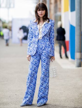SYDNEY, AUSTRALIA - MAY 14: Model Georgia Fowler wearing a blue suit, pearl jacket during Mercedes-Benz Fashion Week Resort 19 Collections at Carriageworks on May 14, 2018 in Sydney, Australia. (Photo by Christian Vierig/Getty Images)