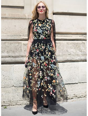 PARIS, FRANCE - JULY 03: Chiara Ferragni poses wearing Dior after the Dior show at the Hotel National des Invalides during Paris Fashion Week Haute Couture FW 17/18 on July 3, 2017 in Paris, France.  (Photo by Vanni Bassetti/Getty Images