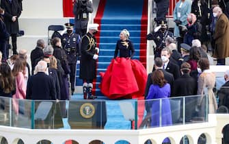 WASHINGTON, DC - JANUARY 20: Lady Gaga arrives to sing the National Anthem at the inauguration of U.S. President-elect Joe Biden on the West Front of the U.S. Capitol on January 20, 2021 in Washington, DC.  During today's inauguration ceremony Joe Biden becomes the 46th president of the United States. (Photo by Rob Carr/Getty Images)