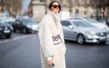 PARIS, FRANCE - MARCH 05: Julie Pelipas is seen wearing white turtleneck, white teddy jacket, brown mini Celine bag outside Miu Miu during Paris Fashion Week Womenswear Fall/Winter 2019/2020 on March 05, 2019 in Paris, France. (Photo by Christian Vierig/Getty Images)