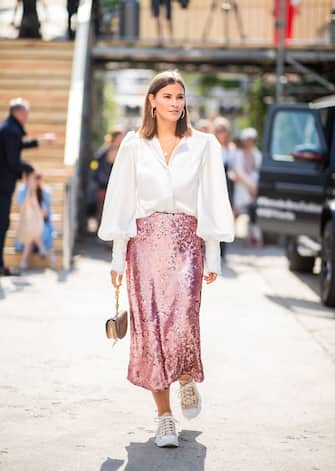 992388624 BERLIN, GERMANY - JULY 05: Nina Schwichtenberg wearing high waist pink glitter, white button shirt, Chloe bag is seen outside Lana Mueller during the Berlin Fashion Week July 2018 on July 5, 2018 in Berlin, Germany. (Photo by Christian Vierig/Getty Images)