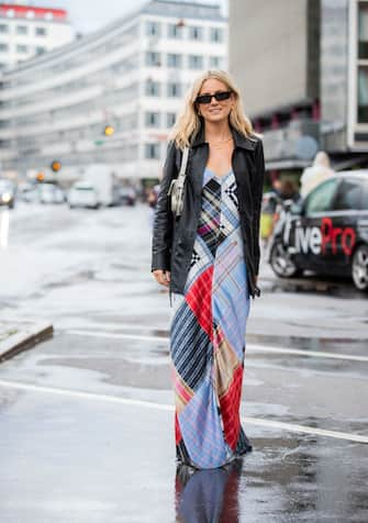 COPENHAGEN, DENMARK - AUGUST 08: Lucy Williams seen wearing leather jacket, multi colored dress wth mixed pattern outside Ganni during Copenhagen Fashion Week Spring/Summer 2020 on August 08, 2019 in Copenhagen, Denmark. (Photo by Christian Vierig/Getty Images)