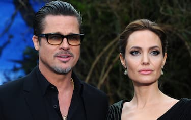 LONDON, ENGLAND - MAY 08:  Brad Pitt and Angelina Jolie attend a private reception as costumes and props from Disney's "Maleficent" are exhibited in support of Great Ormond Street Hospital at Kensington Palace on May 8, 2014 in London, England.  (Photo by Anthony Harvey/Getty Images)