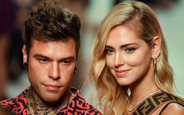 Italian fashion blogger Chiara Ferragni and her husband, Italian rap singer Fedez attend the presentation of the Fendi fashion house collection during the Women's Spring/Summer 2019 fashion shows in Milan, on September 20, 2018. (Photo by Andreas SOLARO / AFP)        (Photo credit should read ANDREAS SOLARO/AFP via Getty Images)