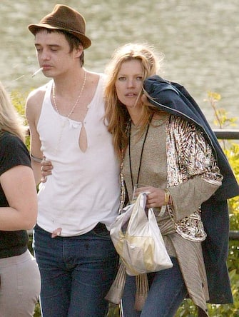 Kate Moss and Pete Doherty during 2005 Isle Of Wight Festival - Day 2 - Backstage at Seaclose Park in Newport, Great Britain. (Photo by Paul Underhill/FilmMagic)