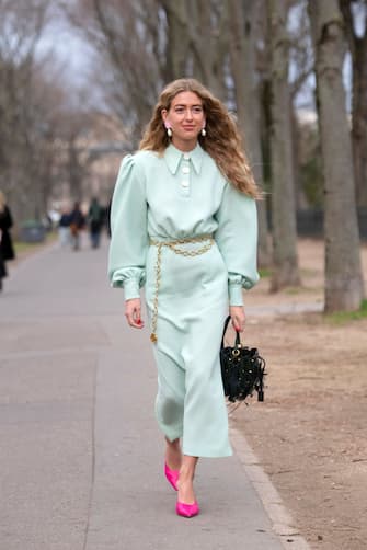 PARIS, FRANCE - MARCH 03: Stylist Emili Sindlev wears a Rowen Rose dress and shoes, Valentino bag and a Chanel belt on March 03, 2019 in Paris, France. (Photo by Kirstin Sinclair/Getty Images)