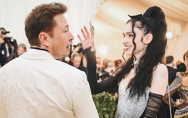 NEW YORK, NY - MAY 07:  Elon Musk and Grimes attend the Heavenly Bodies: Fashion & The Catholic Imagination Costume Institute Gala at The Metropolitan Museum of Art on May 7, 2018 in New York City.  (Photo by Jason Kempin/Getty Images)