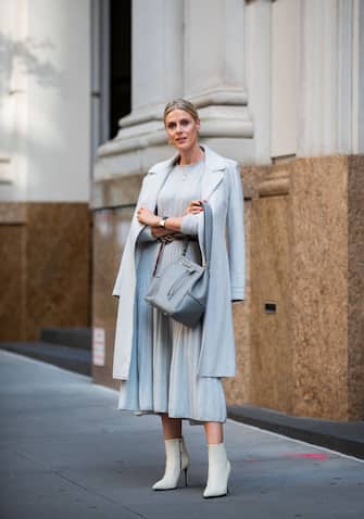 NEW YORK, NEW YORK - SEPTEMBER 09: Sofie Valkiers is seen wearing total look Marc Cain: light blue pleated dress and wool coat, belt, bag, ankle boots during New York Fashion Week September 2019 on September 09, 2019 in New York City. (Photo by Christian Vierig/Getty Images)