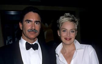 Phil Bronstein and Sharon Stone during The 70th Annual Academy Awards - Elton John AIDS Foundation Party in Beverly Hills, California, United States. (Photo by Ke.Mazur/WireImage)