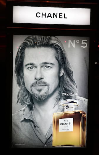 Bus Stop Billboard: Brad Pitt is the first-ever man to sell Chanel No. 5 in an advertising campaign. New York City on 11/21/2012. (Photo by Walter McBride/Corbis via Getty Images)
