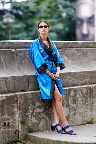 PARIS, FRANCE - JUNE 22:  A guest wears a blue silk kimono, outside Cerruti, during Paris Fashion Week - Menswear Spring-Summer 2019  on June 22, 2018 in Paris, France.  (Photo by Edward Berthelot/Getty Images)